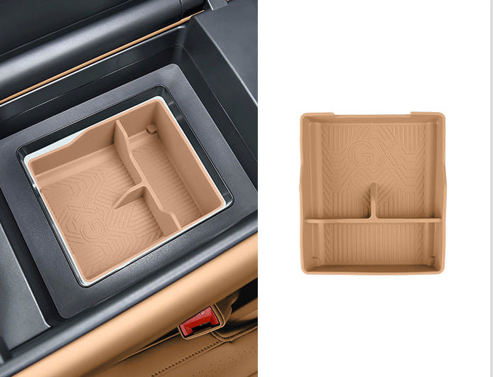 XPeng GX models, the lower silicone storage box of the armrest is a layered, compartmentalized, non-slip storage mat, an interior accessory.